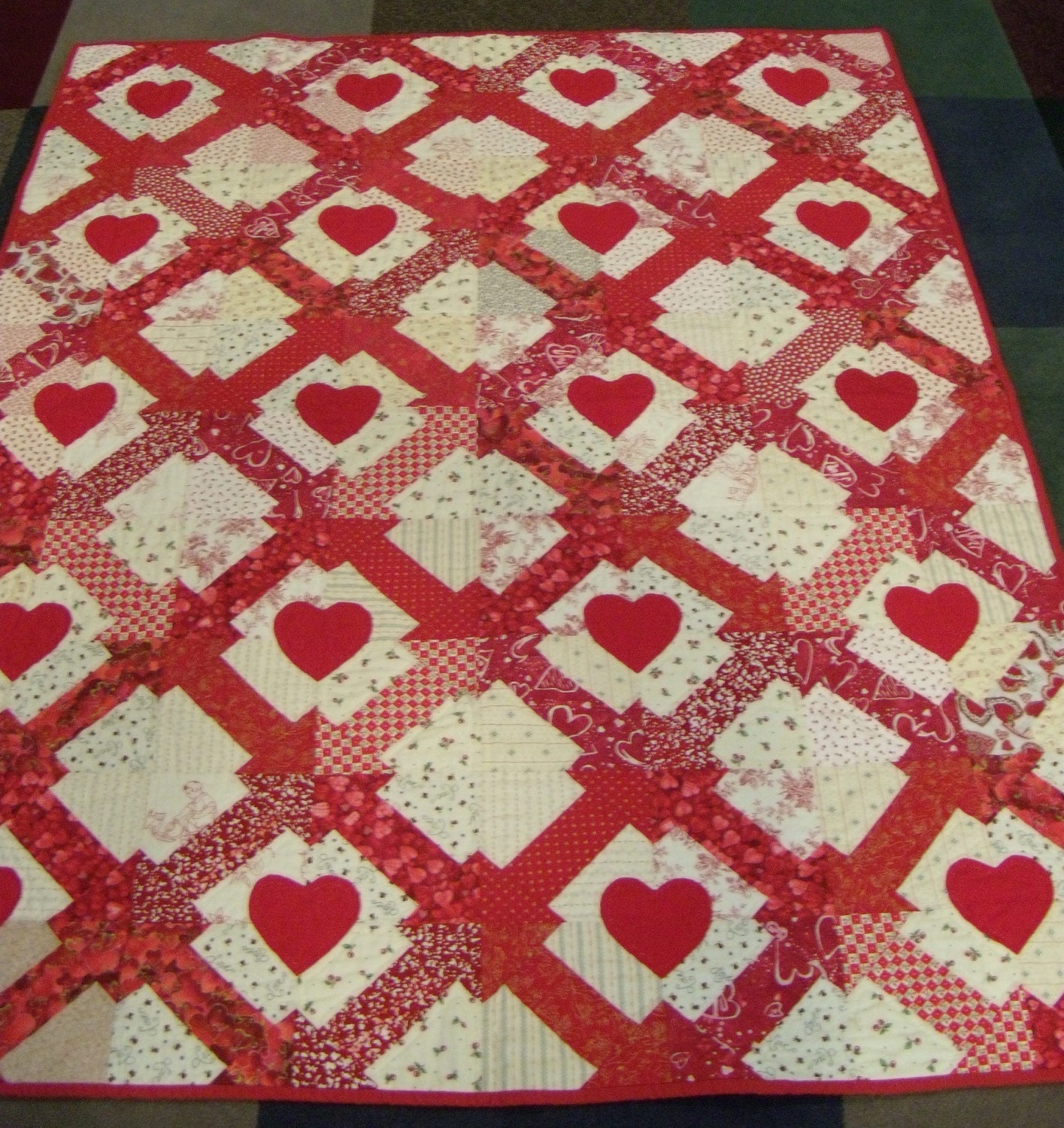 Red and White Applique and Patchwork Quilt. Hearts and Arrows.