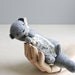 river otter gathering flowers / soft sculpture animal