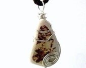 https://www.etsy.com/ie/listing/107602655/brown-sea-pottery-pendant-irish-necklace?ref=shop_home_active_15