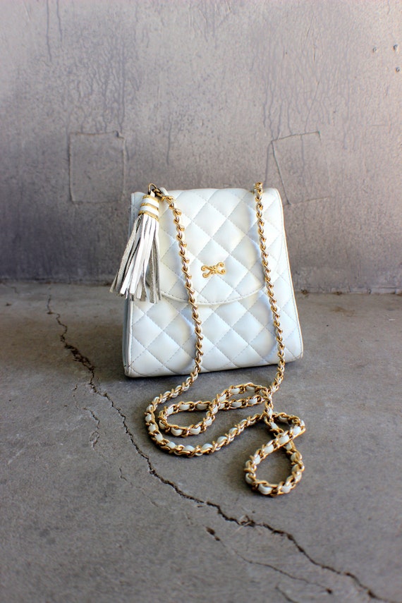 Items similar to White Quilted Purse with Gold Chain Strap and Tassel ...