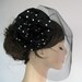 Black flower hair fascinator, cocktail hat, tulle veil, handmade, unique Item, hat bridal mini hat