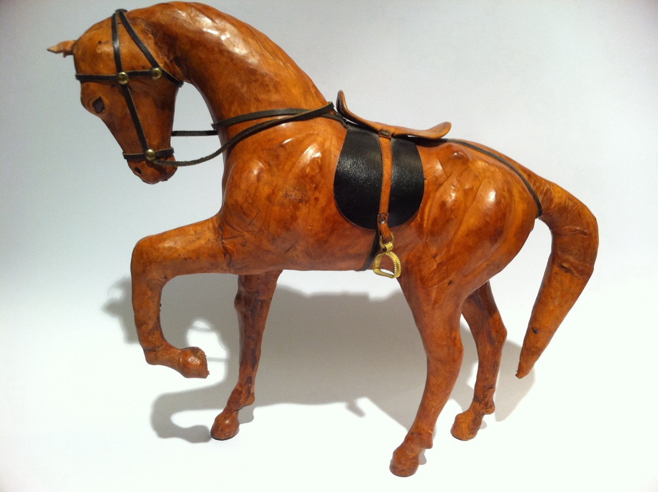 leather covered horse figurine