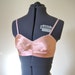 1940s satin bra / deep peach glossy satin bra with lacy edge / rayon 32B 34A