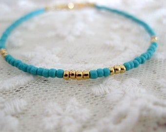 Turquoise and gold seed bead friendship bracelet