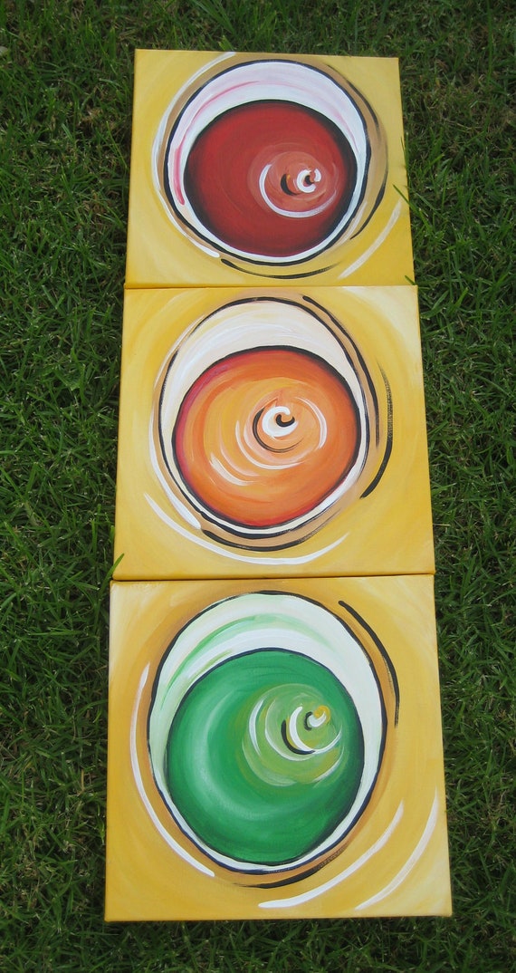 A large original traffic light painting on three 12x