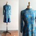 SALE////Vintage 1960s marbled blue dress with velvet hem and double leg slits