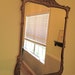 Vintage Chinoiserie Asian Oriental Mirror Golden in Color Pagoda Mirror 1940s-1950s Asymmetrical Design at Modern Logic