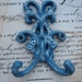 Small Periwinkle and Cream Miniature Floral and Scrolls Cast Iron Double Wall Hook
