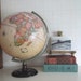 Vintage Cram's Globe..........soft aged pastels..........wood base......metal axis