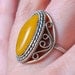 Vintage Baltic amber ring, filigree decor.