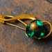 Vintage metal brooch, with glass rhinestones