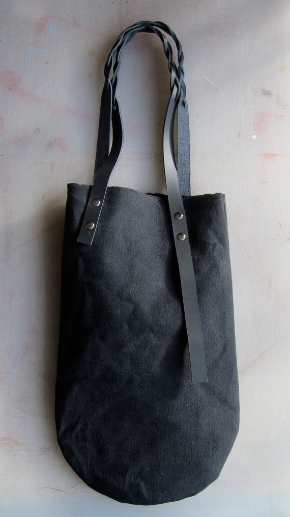 Items similar to canvas bag black with braided leather handles on Etsy