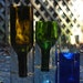 your choice, any color or size. self watering planters made from recycled wine bottles. great gift for spring flowers.