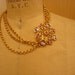 Gold cluster necklace