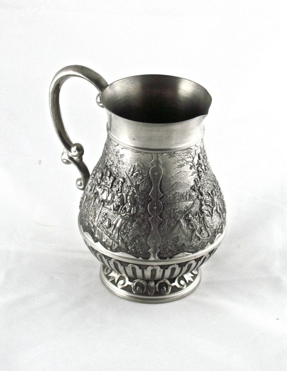 Vintage Pewter Embossed Pitcher by Bluemooncollection on Etsy