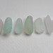 7 sea glass pendant shaped sea glass from England - nicely frosted medium pieces
