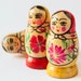Russian Matryoshkas, tiny little nesting dolls, hand painted, red flowers, Soviet Union