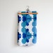 vintage french fabric from the 60's with abstract flower design in aqua, teal, navy and royal blue.