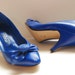 Vintage Women royal saphire blue leather shoes 7 heels pumps with rosette bow. By Dolcis Ready to ship