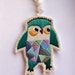 Christmas owl ornament hand embroidered geometric shapes with bright colors
