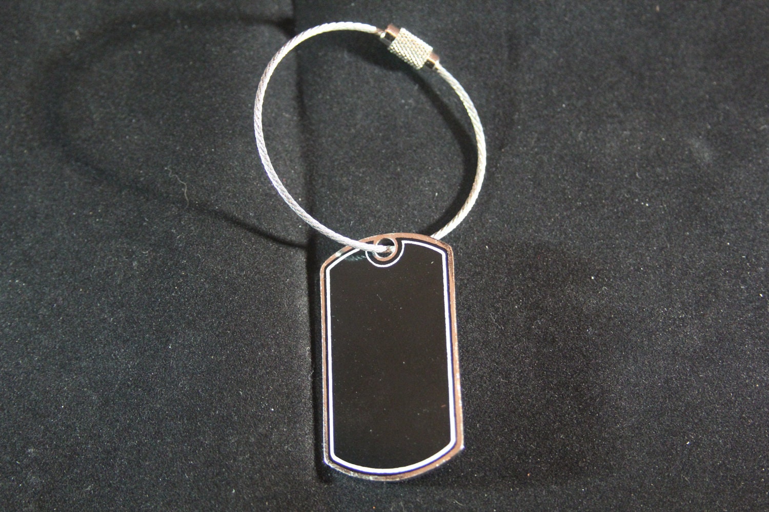 Personalized metal key chains / dog tags