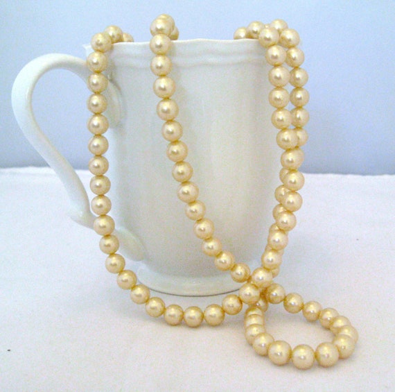 Long Strand of Faux Pearls