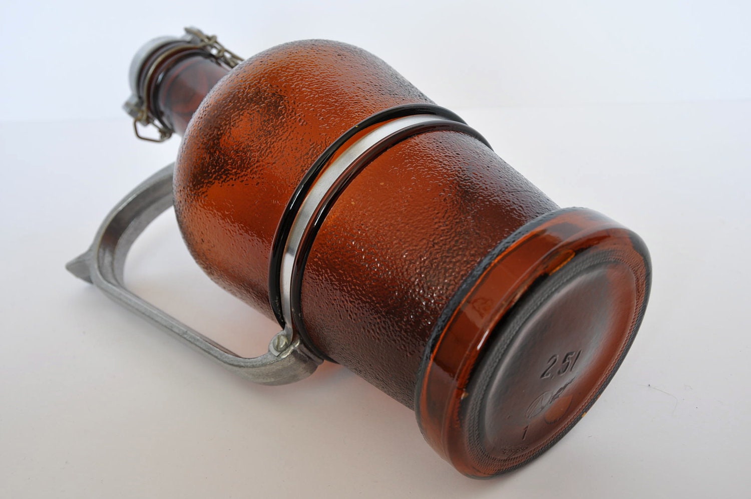 Vintage German Beer Growler with metal handle and metal lid.