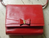 Gorgeous 80's bright red vintage Salvatore Ferragamo bag with a bow on the front - down from 80!