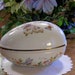 AVON PORCELAIN EGG Box with 22 K Gold Rim 1974
