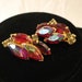 Earrings / Red Iridescent Rhinestone Leaf Clusters / Clip On Earrings
