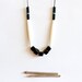 RESTOCK geometric, tribal, black stone cube beads, long white bone beads, czech beads and black rope, long, beaded necklace