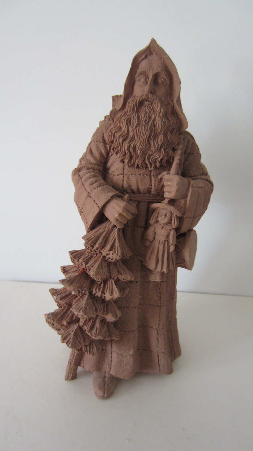 Pecan Resin Santa with Doll and Tree