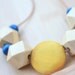 NECKLACE Geometric Wood Beads in Beige, Yellow and Navy strung on Natural Suede Leather Cord