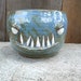 hand thrown, ceramic, goblin tea bowl in Igneous glaze