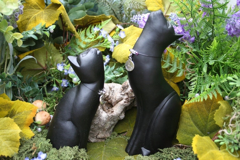 outdoor black cat statue