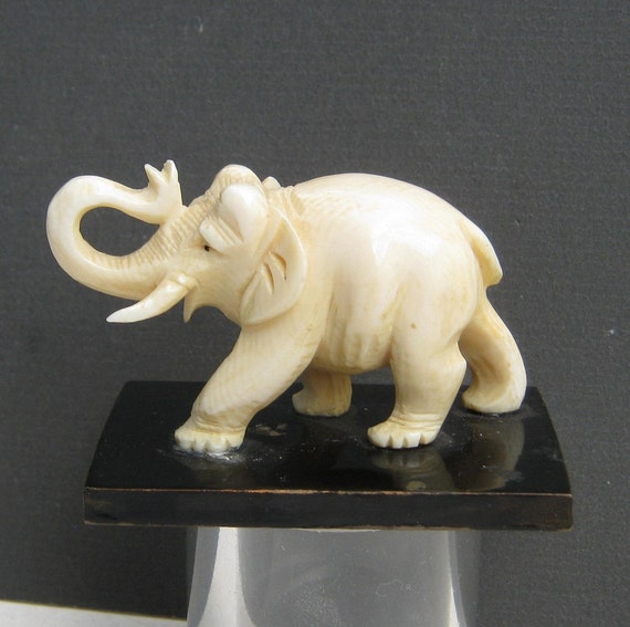 Hand Carved up turned trunk Elephant Figurine by JazzyThings