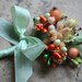 apricot and mint green ribbon wrapped stamen posy