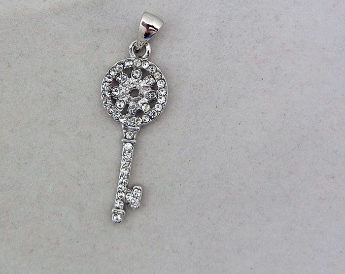 Small Rhinestone Encrusted Skeleton Key with Round Flower Top Pendant