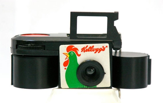 Vintage Keychain Kellogg's 110 film promotional camera and