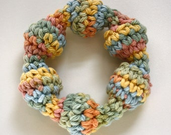 Creamy Soft Baby Rattle, Teething Ring - Multicolored Blue, Green, Pink, and Yellow. Simple Montessori inspired toys for all babies