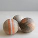 antique croquet ball collection / orange