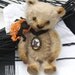 Sir Bram, tiny vintage looking Hug Me Again collectible Mohair bear by V. Galli in Halloween cheer.