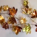 Vintage gold metal leaf wall hanging