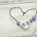 Felted necklace with beach stone and embroidery Lavender White