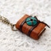 Turquoise & Orange - Vintage Leather Wearable Book with Tea Stained Pages and Turquoise Bead