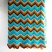 70s Missoni style knit blanket or sofa throw - herringbone hand knit multicolor wool - 58 inch - teal turquoise brown