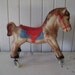 vintage toy riding horse