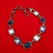 Very vintage 14.5" silver with patina, chunky and heavy necklace with blue faceted square.75" rhinestones