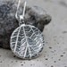Leaf necklace. Silver coin necklace with leaf imprint, round disc pendant with sterling silver chain