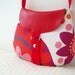 Crossbody bag in red. Flowers print and faux leather details